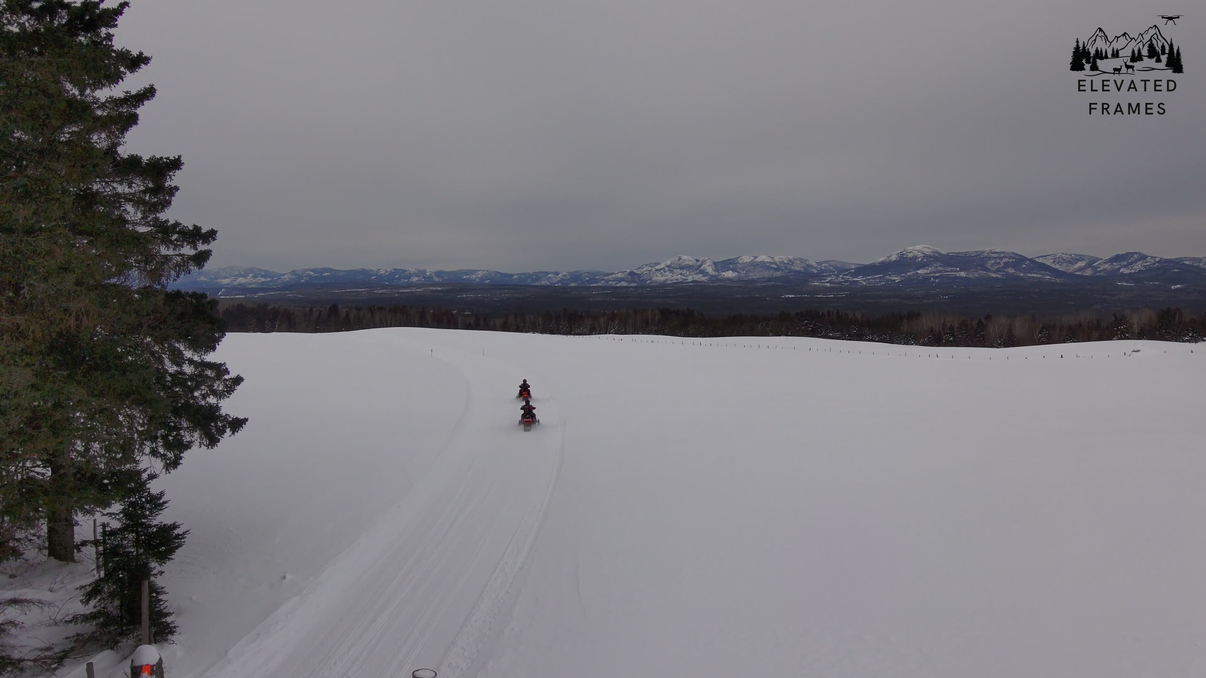 Group snowmobiling adventure in Quebec